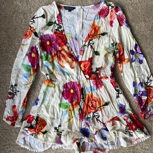 Colorful Floral Romper with Trim Details